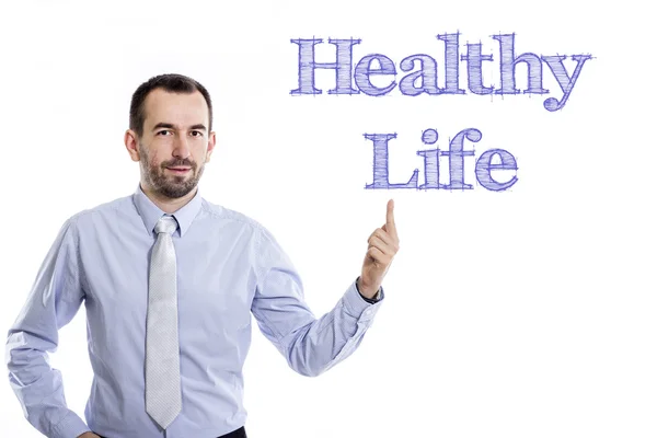 Здоровый образ жизни - Молодой бизнесмен с синим текстом — стоковое фото