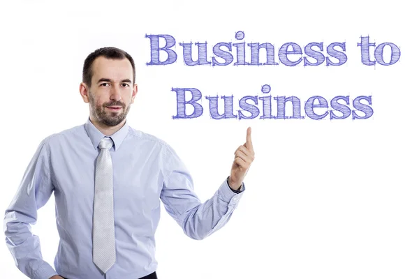 Business to Business - Young businessman with blue text — Stock Photo, Image