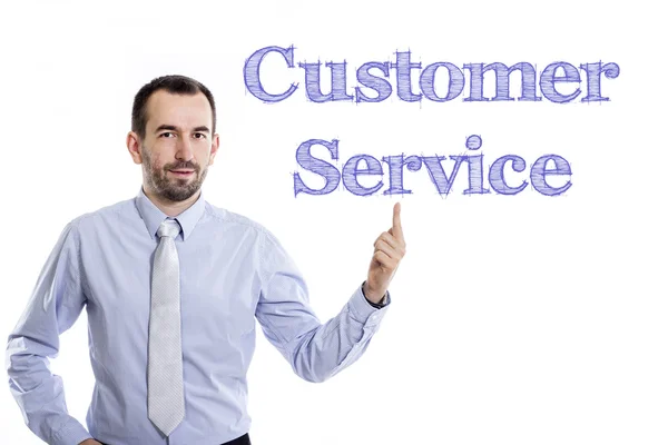 Обслуживание клиентов - Молодой бизнесмен с синим текстом — стоковое фото