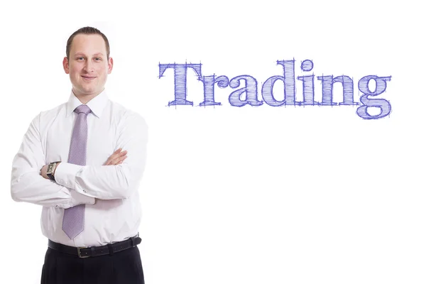 Trading - Giovane imprenditore con testo blu — Foto Stock