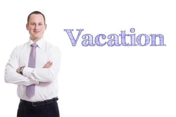 Vacation - Young businessman with blue text — Stock Photo, Image