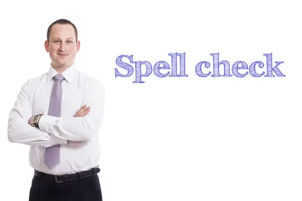 Spell check - Young businessman with blue text — Stock Photo, Image