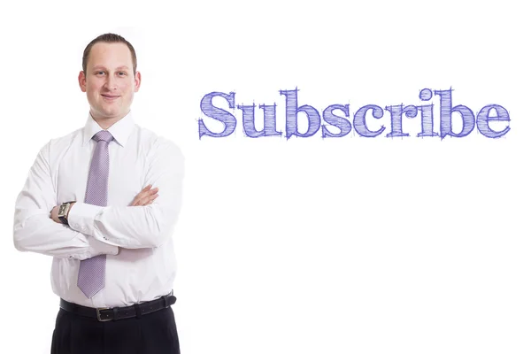 Subscribe - fiatal üzletember, kék szöveggel — Stock Fotó