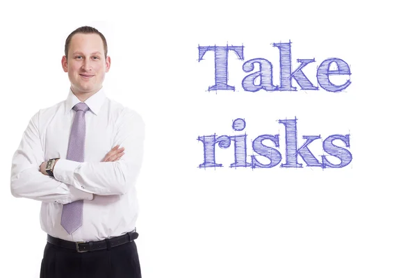 Take risks - Young businessman with blue text — Stock Photo, Image