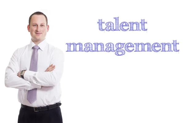 Talent management - Young businessman with blue text — Stock Photo, Image