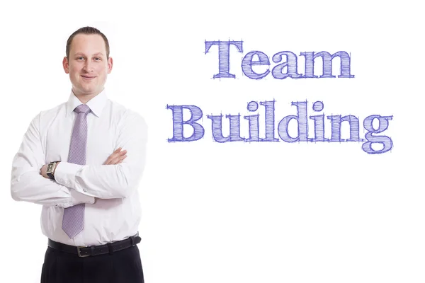 Team Building - Jovem empresário com texto azul — Fotografia de Stock