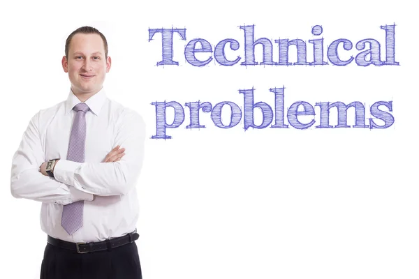 Technical problems - Young businessman with blue text — Stock Photo, Image