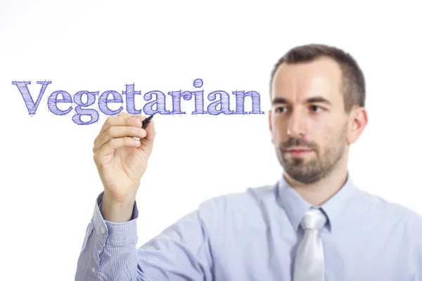 Vegetarier - junger Geschäftsmann schreibt blauen Text — Stockfoto