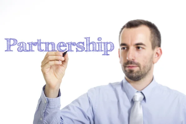 Partnerstwo - młody biznesmen pisania niebieski — Zdjęcie stockowe