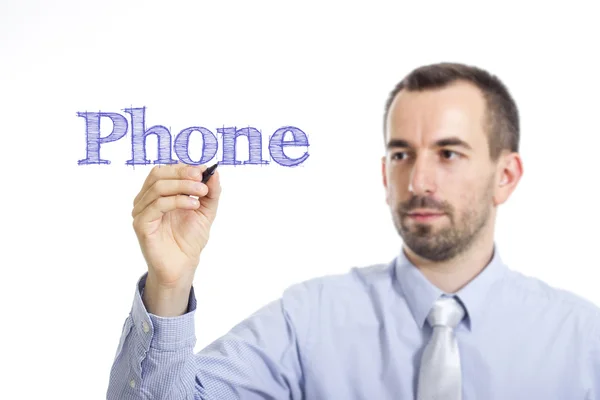 Telefon - junger Geschäftsmann schreibt blauen Text — Stockfoto