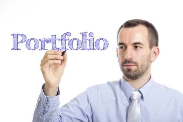 Portfólio - Jovem empresário escrevendo texto azul — Fotografia de Stock