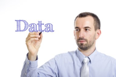Data - Young businessman writing blue text on transparent surface
