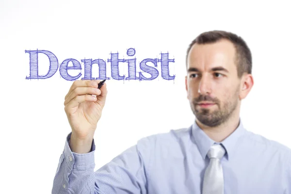 Dentista - Giovane imprenditore che scrive testo blu su superficie trasparente — Foto Stock