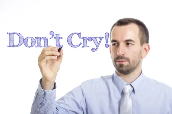 Don't Cry! - Young businessman writing blue text on transparent surface — Stock fotografie