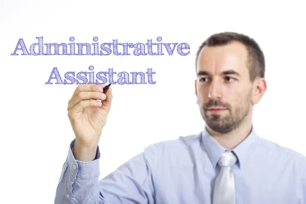 Administrative Assistant - Young businessman writing blue text — Stock Photo, Image