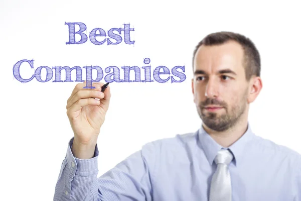 Best Companies - Young businessman writing blue text on transparent surface — 图库照片