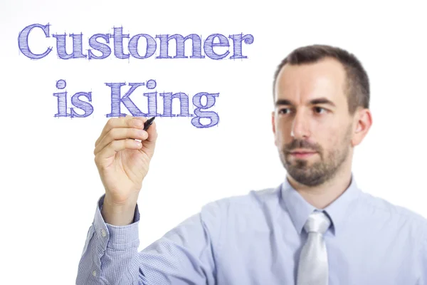 Πελάτης είναι βασιλιάς - νέος επιχειρηματίας με μπλε κείμενο — Φωτογραφία Αρχείου