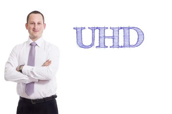 UHD  - Young businessman with blue text — Stock Photo, Image