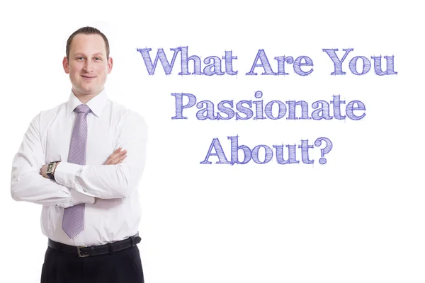 What Are You Passionate About? - Young businessman with blue text — Stock Photo, Image