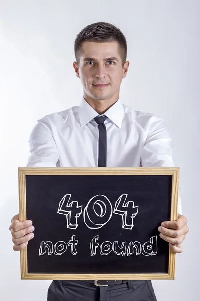 404 No encontrado - Joven empresario sosteniendo pizarra — Foto de Stock