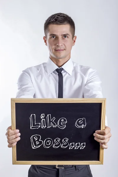 Like a Boss... - Young businessman holding chalkboard — Stock Photo, Image