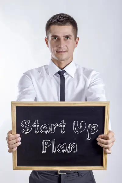 Plan - jonge zakenman schoolbord bedrijf opstarten — Stockfoto