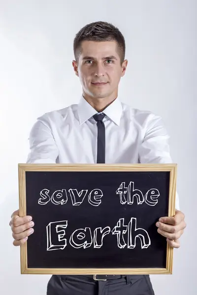 Save the Earth - Young businessman holding chalkboard — Stock Photo, Image