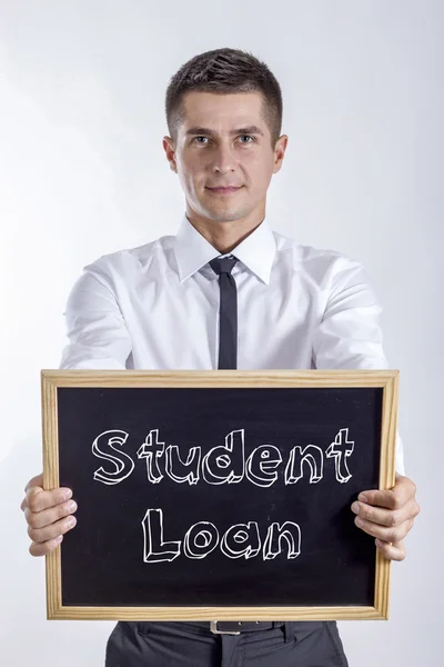 Studentenkredit - junger Geschäftsmann mit Kreidetafel — Stockfoto