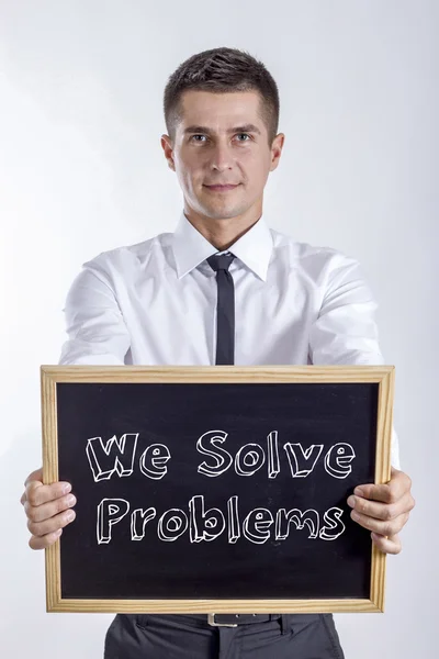 Εμείς λύσει προβλήματα - νέος επιχειρηματίας που κατέχουν Μαυροπίνακας — Φωτογραφία Αρχείου