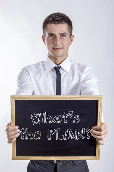 ¿Cuál es el plan? - Joven hombre de negocios sosteniendo pizarra — Foto de Stock