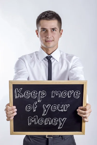 Houden meer van uw geld - jonge zakenman houden schoolbord met tekst — Stockfoto