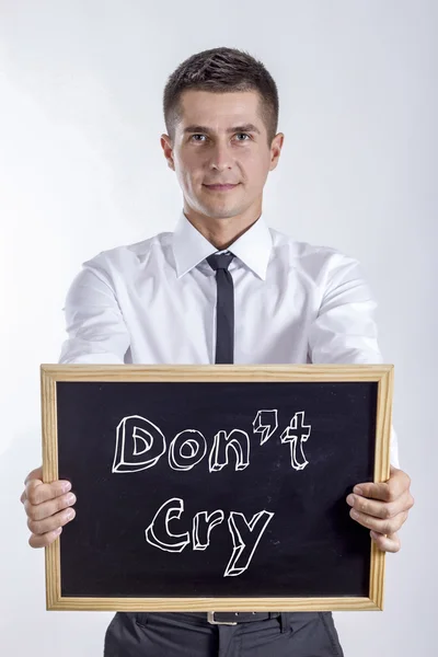 Neplakej - mladý podnikatel drží tabule s textem — Stock fotografie