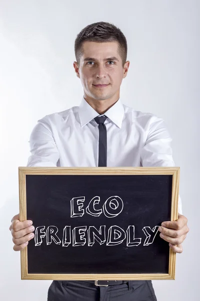 Οικολογικό φιλικό - νέος επιχειρηματίας που κατέχουν Μαυροπίνακας — Φωτογραφία Αρχείου