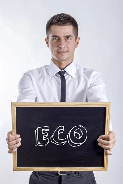 Eco - νέος επιχειρηματίας που κατέχουν Μαυροπίνακας — Φωτογραφία Αρχείου