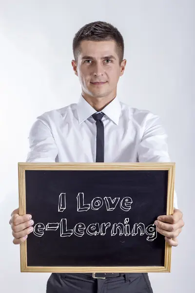 I Love e-Learning - Jeune homme d'affaires tenant tableau — Photo