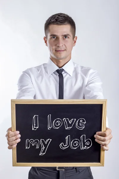 Ik hou van mijn werk - jonge zakenman houden schoolbord — Stockfoto