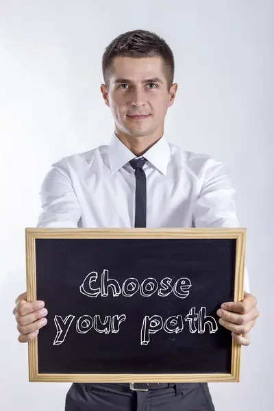 Válassz utat - fiatal üzletember gazdaság Palatábla szöveggel — Stock Fotó