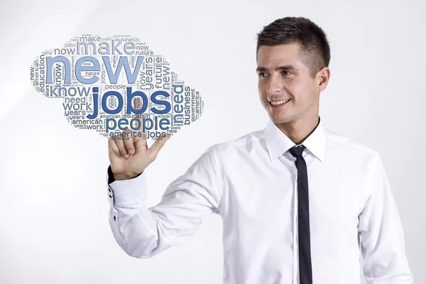 Nowych miejsc pracy - młody biznesmen dotykając chmura niebieski słowo — Zdjęcie stockowe