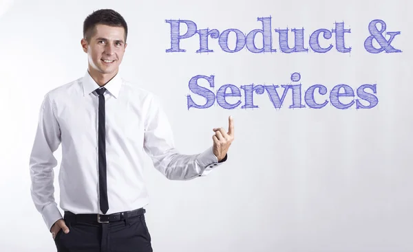 Product & Services - Young smiling businessman pointing on text — Stock Photo, Image