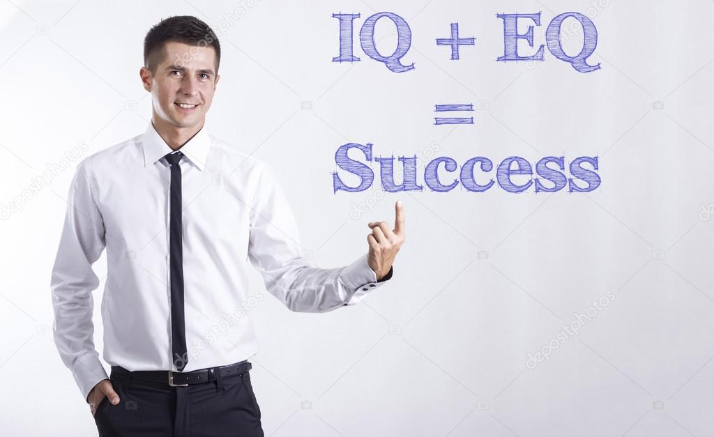 IQ + EQ   Success - Young smiling businessman pointing on text