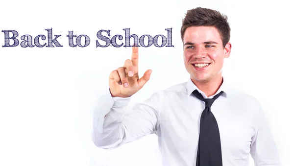 Zpátky do školy - mladý usmívající se podnikatel dotýká text — Stock fotografie