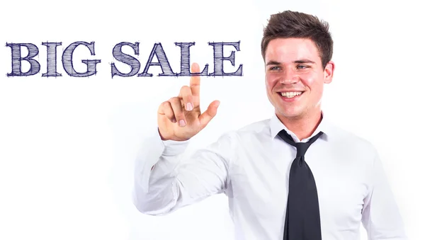 BIG SALE - Young smiling businessman touching text — Stock Photo, Image