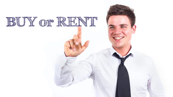 Koop of huur - jonge lachende zakenman raakt tekst — Stockfoto