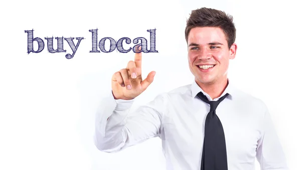 Buy local - Young smiling businessman touching text — Stock Photo, Image