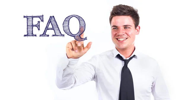 FAQ - mladý usmívající se podnikatel dotýká text — Stock fotografie