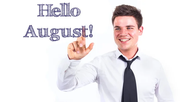 Привет Август! - Молодой улыбающийся бизнесмен трогает текст — стоковое фото