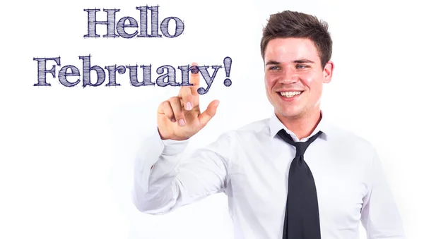 ¡Hola febrero! - Joven sonriente hombre de negocios tocar texto —  Fotos de Stock