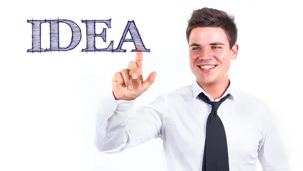 IDEA - Giovane uomo d'affari sorridente toccando testo — Foto Stock