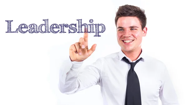 Przywództwo - młody biznesmen uśmiechający się wzruszający tekst — Zdjęcie stockowe