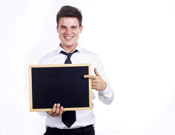 Молодий бізнесмен тримає чисту дерев'яну дошку — стокове фото